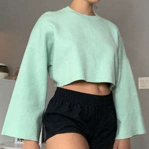Cropped knit teal sweater